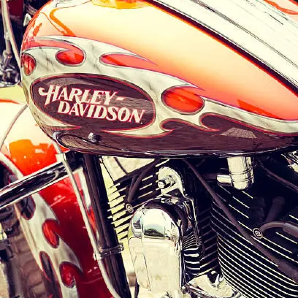 ForlA, Italy - July 13, 2013: Detail of Harley Davidson logo in a tank of motorcycle. Harley Davidson is an American motorcycle manufacturer founded in Milwaukee ,Wisconsin USA. No people